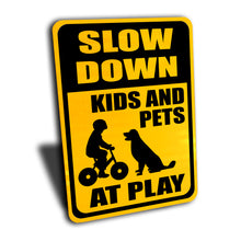 Load image into Gallery viewer, Slow Down Kids and Pets at Play Sign, Engineer Grade Reflective, Aluminum.
